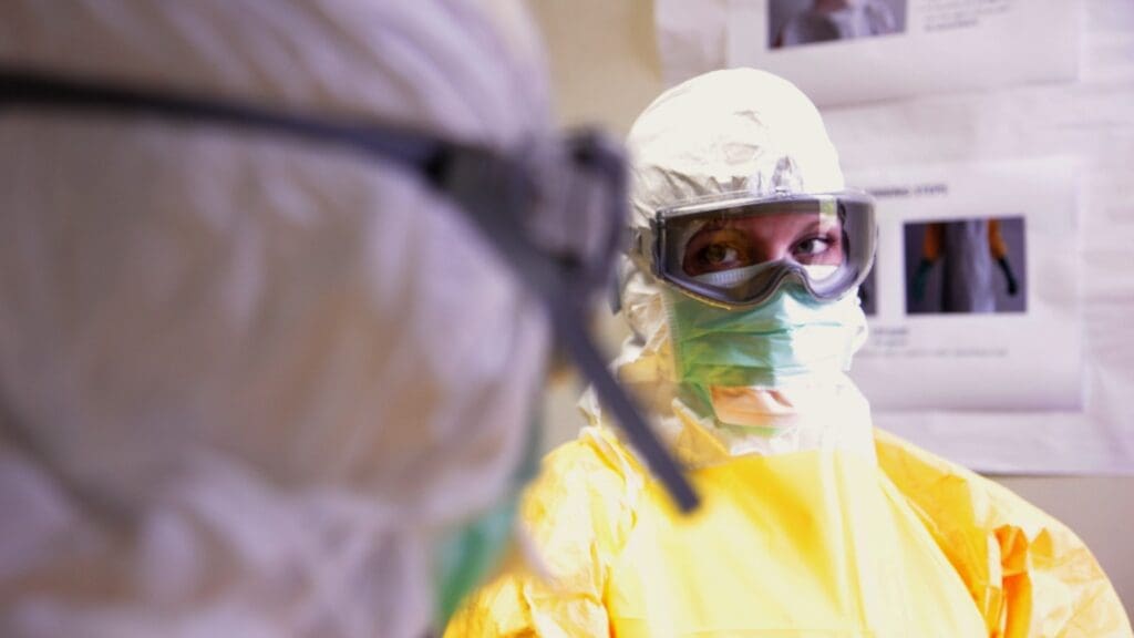Healthcare worker in protective clothes